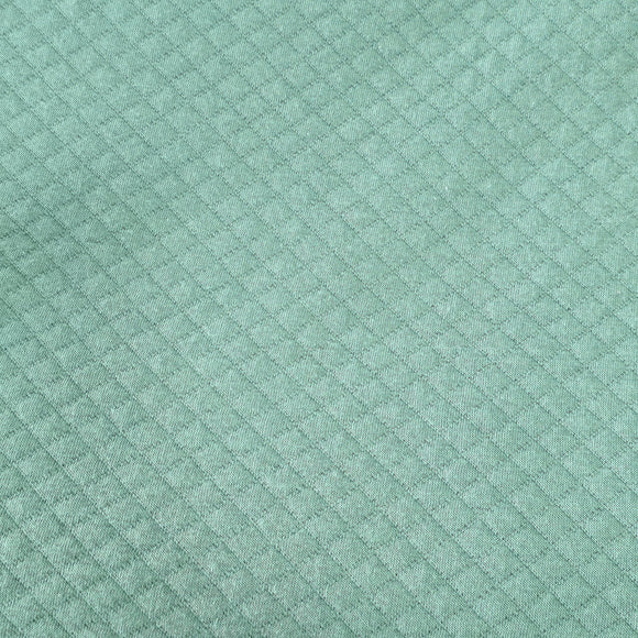 Vert doux - Tricot de coton matelassé (au 1/2m)