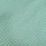 Vert doux - Tricot de coton matelassé (au 1/2m)