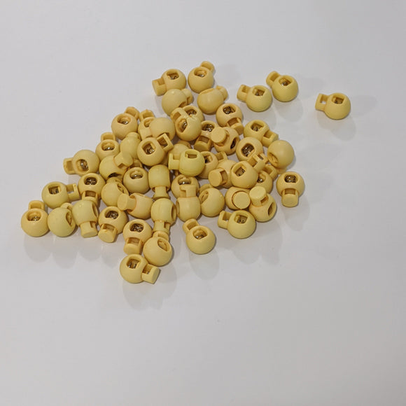 Bloque-cordon 8mm - Jaune beurre